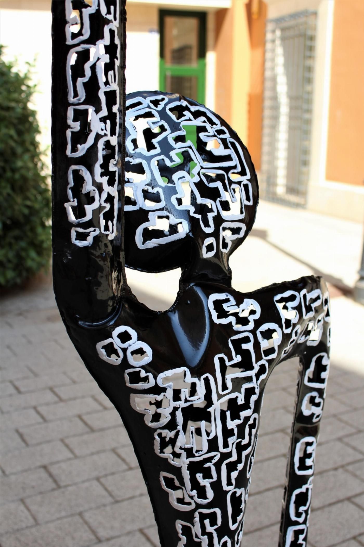 escultura tattoo negro